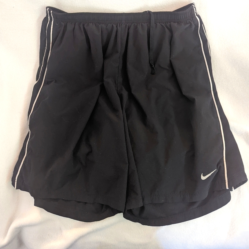 Nike Dri-fit running shorts with compression lining and 2 pockets, elastic waist